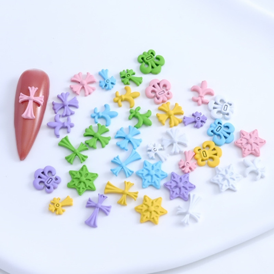 Amuletos de unhas cruzadas